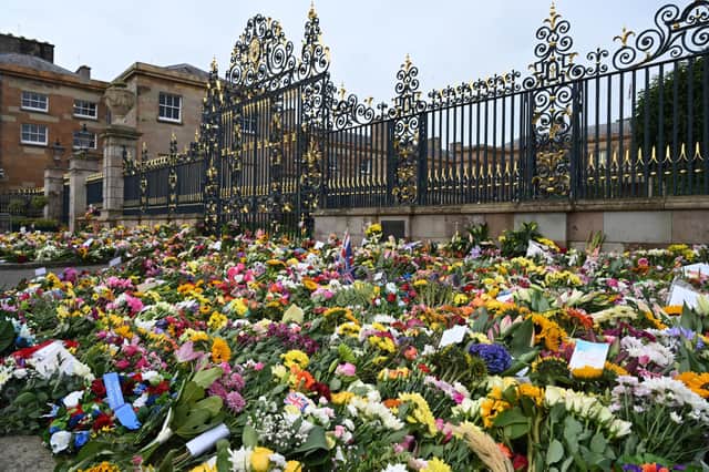Floral tributes to Queen Elizabeth II outside Hillsborough Castle