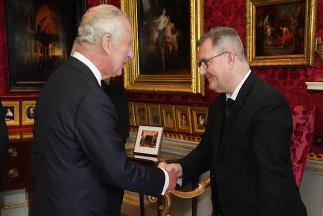 King Charles III meeting DUP leader Jeffrey Donaldson as Northern Ireland Assembly Speaker Alex Maskey looks on at Hillsborough Castle, Co Down. Picture date: Tuesday September 13, 2022.