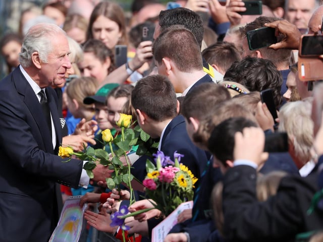 New King and Queen Consort talk with the crowds