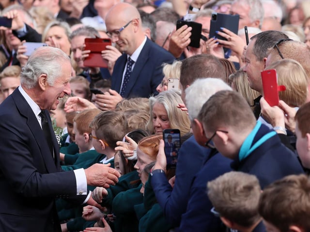 Crowds come out to welcome King Charles