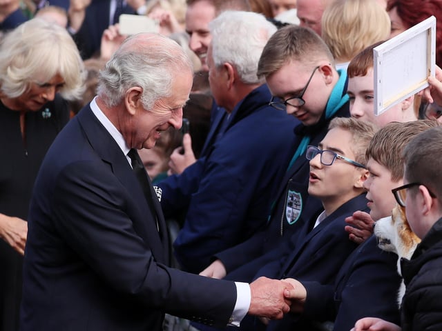 Crowds come out to welcome King Charles