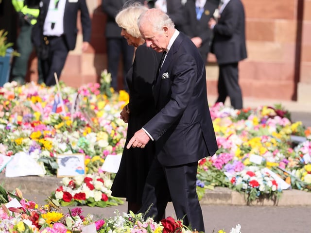 Crowds come out to welcome King Charles