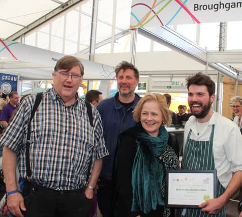 The new award will recognise the contribution of the late Charles Campion, left, a distinguished English food writer, to the food and drink industry here. He is pictured at Balmoral Show with, right, Charlie Cole of Broughgammon Farm Products in Ballycastle, Xanthe Clay, food writer at Daily Telegraph, and food writer John Evans