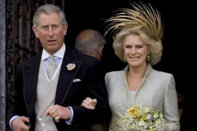 The Prince of Wales and his bride Camilla, Duchess of Cornwall leave St George's Chapel in Windsor, following the church blessing of their civil wedding ceremony.