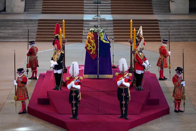 The vigil begins around the coffin of Queen Elizabeth II in Westminster Hall, London, where it will lie in state ahead of her funeral on Monday. Picture date: Wednesday September 14, 2022.