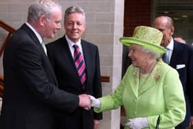 The famous image of Martin McGuinness and the Queen shaking hands at the Lyric Theatre, Belfast, in 2012