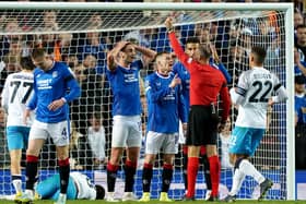 Rangers' James Sands (centre) is shown a red card during the UEFA Champions League Group A match at Ibrox Stadium, Glasgow against Napoli. Pic by PA.