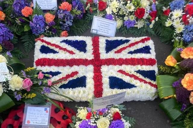 Stephen Watson of Watsons Flowers and Gifts in Ballynahinch worked through much of the night to create this special two-foot-long Union Flag wreath.