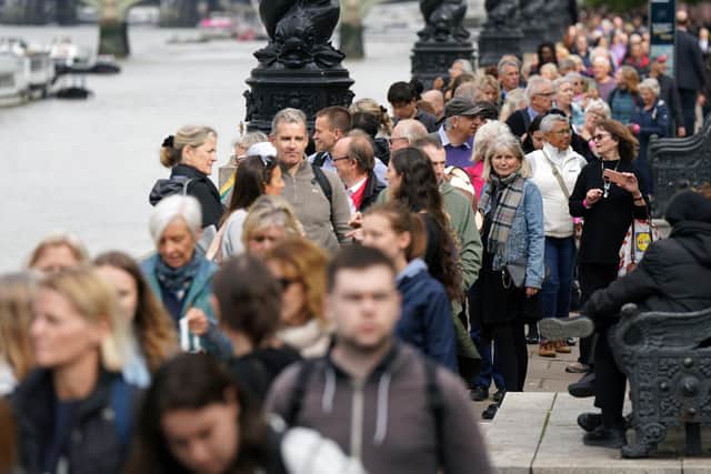 Members of the public in the queue on the South Bank near to Lambeth Bridge, London, as they wait to view Queen Elizabeth II lying in state ahead of her funeral on Monday. Picture date: Thursday September 15, 2022.