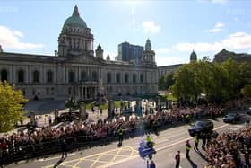 One of the many dramatic moments of the week was the joyful crowds which gathered as the king passed Belfast City Hall on Tuesday. "I have only ever seen photographs of central Belfast being laid out in this way, with crowds stretched all along the long boulevard that runs from Royal Belfast Academical Institution to the Law Courts. This set-up was used for military marches after the Great War, but I do not recall it in my life"