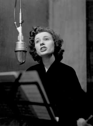 British pop singer Ruby Murray recording at the EMI Columbia UK Studios.  (Photo by Reg Davis/Express/Getty Images)