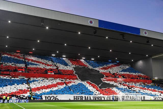 A vast silhouette of the Queen amid the colours of the Union Jack could be seen behind one of the goals at Ibrox before the game kicked off.