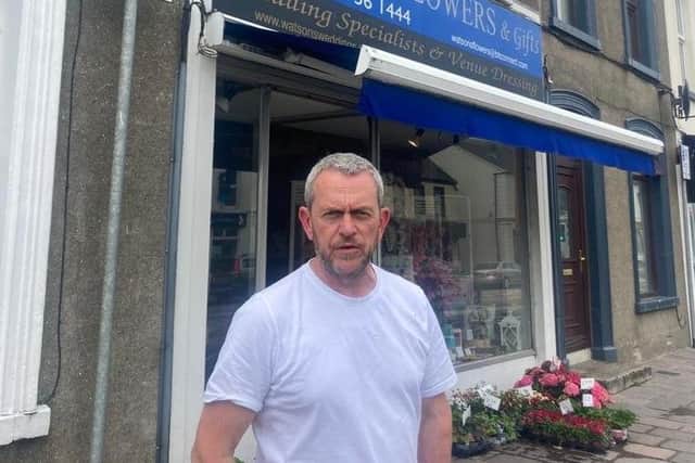 Stephen Watson of Watsons Flowers and Gifts in Ballynahinch, worked through most of the night to complete a commission for a Union Flag wreath to honour the Queen.