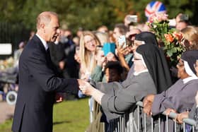 The Earl of Wessex meeting wellwishers outside Windsor Castle in Berkshire