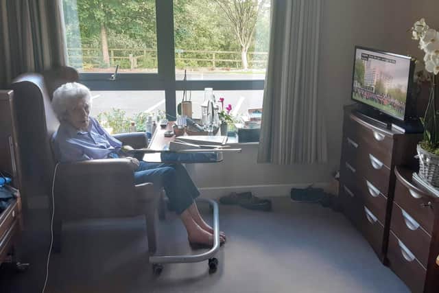 Lady Moyra Moyola watching the funeral procession in her room at the Somme Nursing Home