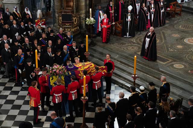 The coffin is placed near the altar at the State Funeral of Queen Elizabeth II, held at Westminster Abbey, London