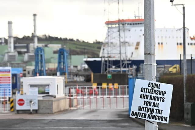 An anti-Protocol poster outside the Port of Larne earlier this year. In an intervention in the High Court last week, the UK Government submitted that in matters of trade ‘the UK is no longer a unitary state’