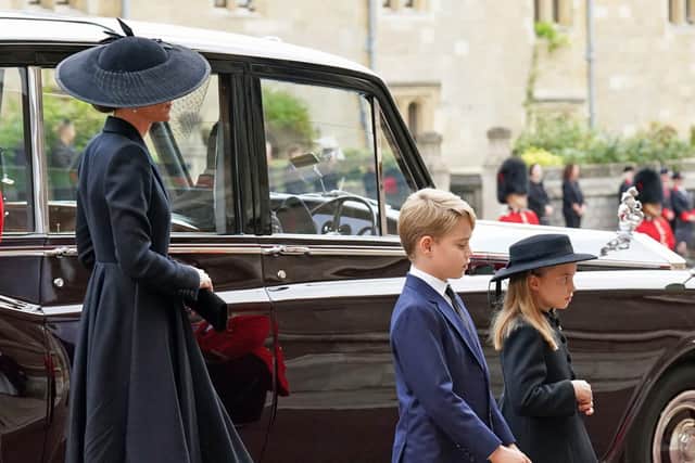 The Princess of Wales, Prince George and Princess Charlotte arrive at the Committal Service for Queen Elizabeth II held at St George's Chapel in Windsor Castle