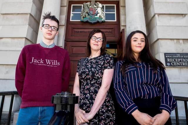 Siobhan McLaughlin (centre), pictured with children Billy and Rebecca Adams, won a landmark case in 2018