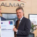 Almac Group CEO Alan Armstrong with Kieran Harding, managing director of Business in the Community NI