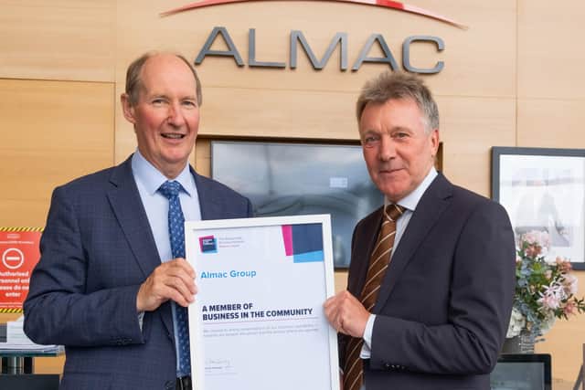 Almac Group CEO Alan Armstrong with Kieran Harding, managing director of Business in the Community NI