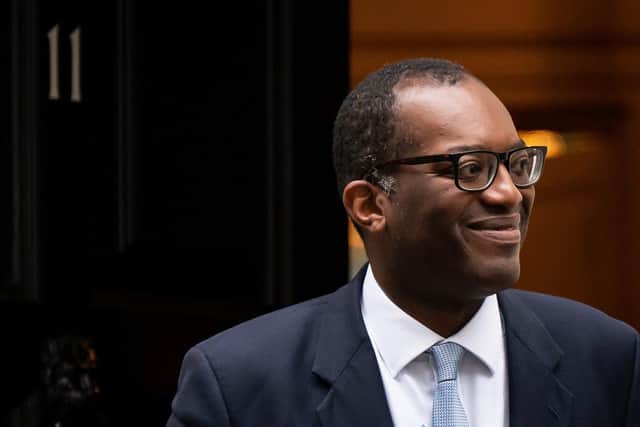 Chancellor of the Exchequer Kwasi Kwarteng leaves 11 Downing Street to make his way to the Treasury Department to deliver his mini-budget