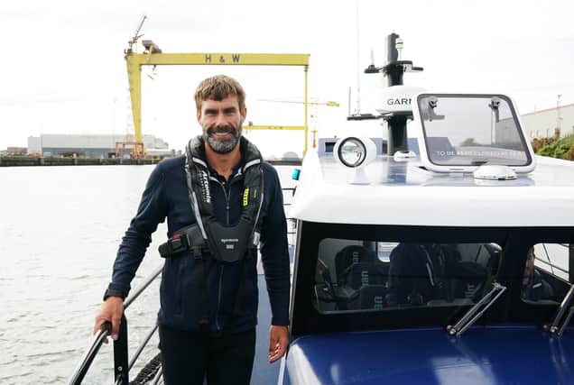 Artemis Technologies CEO Dr Iain Percy aboard the company's  hydrofoiling workboat ‘Pioneer’.