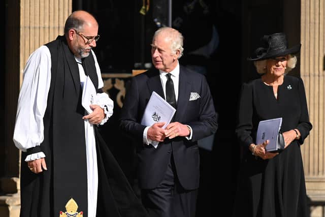 King Charles III and Queen Consort Camilla after the service in St Anne’s Cathedral on September 13