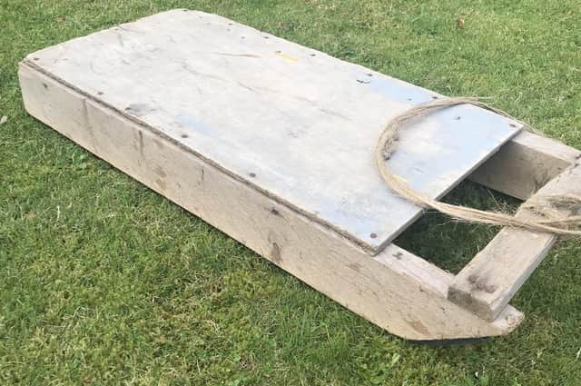 The old wooden sledge holds a treasure trove of memories