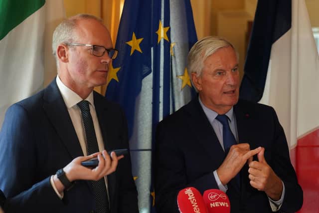 Irish Foreign Affairs Minister Simon Coveney (left) and Former EU Brexit negotiator Michel Barnier speaking to the media at Iveagh House, the Department of Foreign Affairs, in Dublin. Picture date: Wednesday September 28, 2022. Photo: Brian Lawless/PA Wire