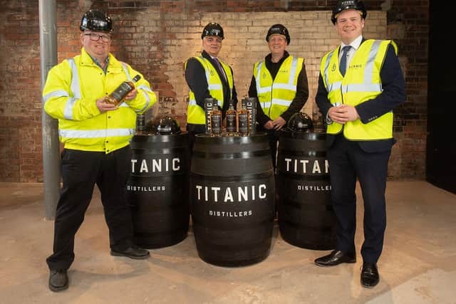 Titanic Distillers directors Peter Lavery and Richard Irwin with Invest NI Interim CEO Mel Chittock and Economy Minister Gordon Lyons