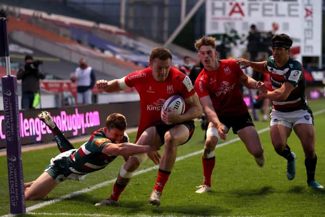 Ulster's Jacob Stockdale is tackled by Guy Porter of Leicester Tigers during the European Rugby Challenge Cup match at Welford Road on April 30, 2021 in Leicester, England. (Photo by Alex Pantling/Getty Images)