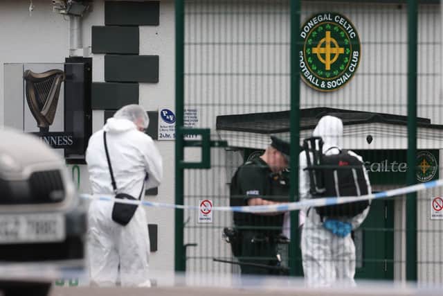 Scenes of crime officers from the PSNI at the scene following a shooting at the clubhouse of Donegal Celtic Football Club, in west Belfast.  Photo: Liam McBurney/PA Wire