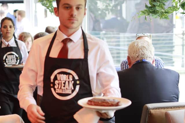 Waiters bringing the steaks to expert judges for tasting in the prestigious World Steak Challenge in Dublin last week