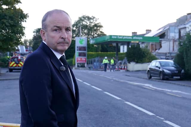 Taoiseach Micheal Martin on Saturay visits the scene of an explosion at Applegreen service station in the village of Creeslough in Co Donegal, where ten people have now been confirmed dead. Photo: Brian Lawless/PA Wire