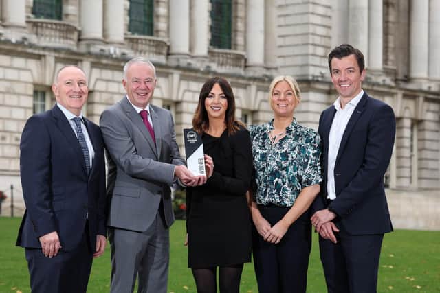 Pictured with the award is Gerry Lennon, chief executive of Visit Belfast, John Walsh, chief executive of Belfast City Council, Rachael McGuckin, director of business development, sustainability and transportation at Visit Belfast, Nikki Paterson, interim business solutions manager at Tourism NI and Charlie McCloskey, director of events and customer experience at ICC Belfast