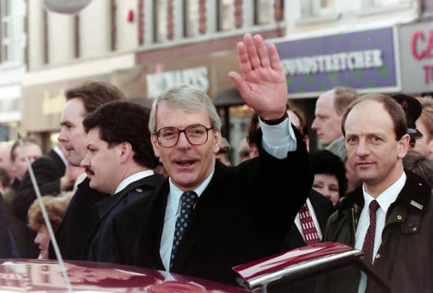 John Major, the prime minister, on a walkabout in Portadown with his wife Norma and the then MP David Trimble in December 1994. Sir John, who as PM often resisted Irish nationalist pressure, has said the exact terms for calling a border poll should be set out. This is alarmingly misguided