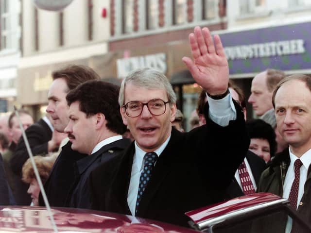 John Major, the prime minister, on a walkabout in Portadown with his wife Norma and the then MP David Trimble in December 1994. Sir John, who as PM often resisted Irish nationalist pressure, has said the exact terms for calling a border poll should be set out. This is alarmingly misguided
