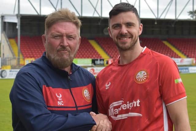 Niall Currie with new signing Dale Montgomery. Credit: Portadown FC