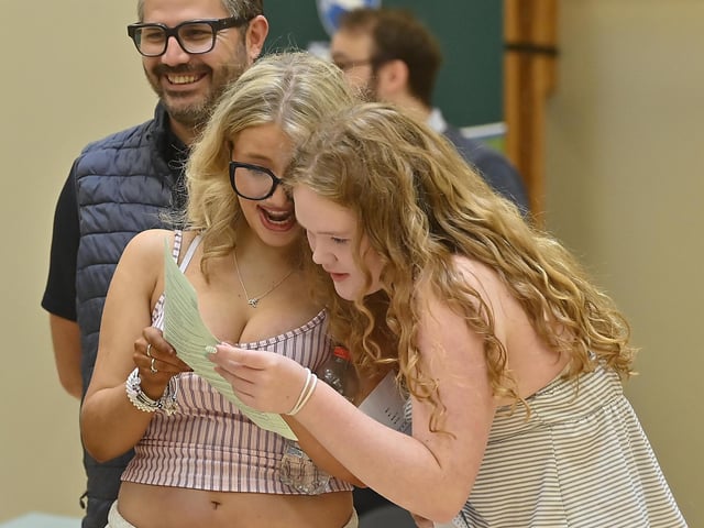 Pupils at Grosvenor Grammar school in Belfast pictured receiving their GCSE exam grades