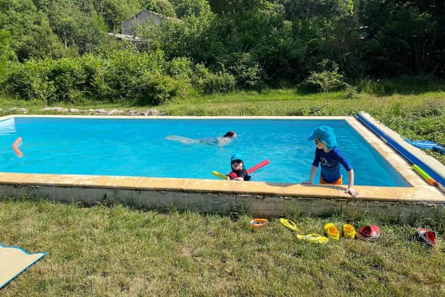 Europe heatwave: The Rooney family from Belfast are on holiday in southwestern France - here the children take a dip in the pool to keep cool