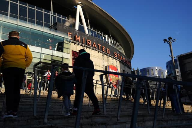 File photo of fans outside Arsenal's Emirates Stadium. UEFA insists this week's Champions League quarter-final ties will go ahead as scheduled amid an Islamic State terror threat