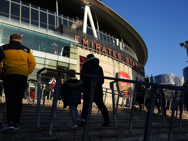File photo of fans outside Arsenal's Emirates Stadium. UEFA insists this week's Champions League quarter-final ties will go ahead as scheduled amid an Islamic State terror threat