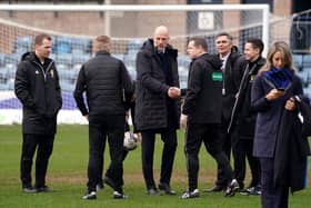Rangers manager Philippe Clement with officials after the cinch Premiership match was called off at the Scot Foam Stadium at Dens Park, Dundee