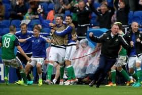 The crowning achievement of his first spell in charge was reaching the 2016 Euros in France. Above Michael O'Neill after Northern Ireland's second goal of a Euro 2016, Group C match in Lyon on June 16 of that year. Pic: Nick Potts/PA Wire