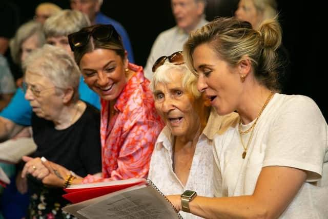 Vicky McClure singing with one of many choirs funded to help those suffering with dementia. Applications for grants will open again on February 13