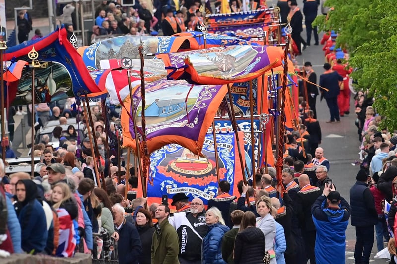 The banners billow in the wind at the Orange Order parade in Banbridge on Thursday evening to mark the King’s Coronation
