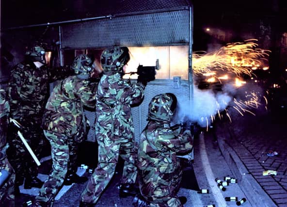 Soldiers during a riot with nationalists in Londonderry during the Troubles