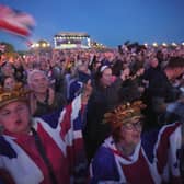 The crowd at the Coronation Concert held in the grounds of Windsor Castle, Berkshire, to celebrate the coronation of King Charles III and Queen Camilla yesterday.