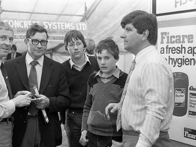 William McKillen of Tullymar Agency discussing veterinary equipment at the pig fair in September 1982, with Jim Grant, Aghalee, and his sons, Thomas and Nigel. On the right John Neillis of Fisons. Picture: News Letter archives